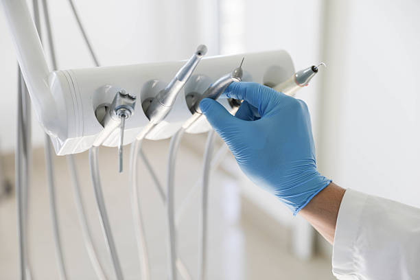 Professional Tooth Extraction technician working in Carbondale, KS